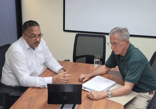 Ken Brown consulting on estate planning with an American expat in Thailand
